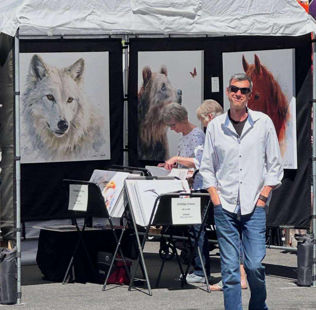 David Harding watercolor artwork displayed at an art show